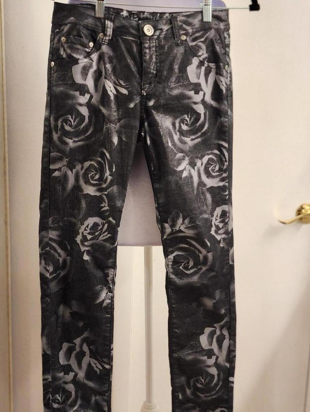 Gothic black floral denim skinny pants with dark romantic silver rose print.